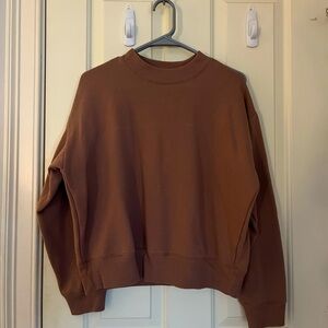light brown crewneck. size S/M